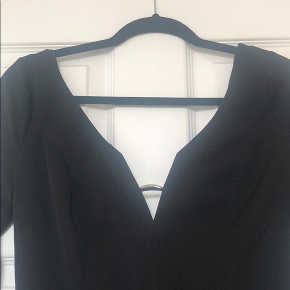 Mini black form fitting mini dress w long sleeves. - Picture 4 of 4